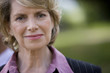 Portrait of mature businesswoman smiling, close-up
