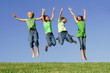 group of happy smiling summer children jumping