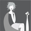 femme dans fauteuil gris