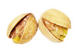 two pistachios on white background closeup