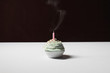 Single cupcake with blown out birthday candle