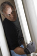 Burglar breaking into house