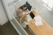 High angle view of two businesswomen working in an office