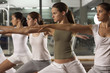 Foto: Five young women doing yoga in a gym Five young women doing yoga in a gym