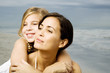 A mother and daughter on a beach