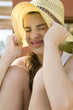 Portrait of young girl in hat
