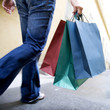 A person carrying shopping bags