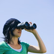 Teen with binoculars