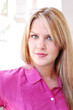 portrait of young blond business woman in pink blouse portrait of young blond business woman in pink blouse