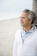 A senior man on a beach