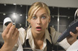 Photo: Portrait of a businesswoman reviewing data from an adding machine and looking shocked Portrait of a businesswoman reviewing data from an adding machine and looking shocked