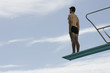 A diver standing on a diving board