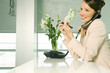 A receptionist talking on the telephone
