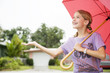 A young girl with an umbrella