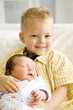 A young boy with his new sibling