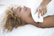 A young woman laying down