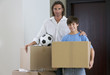 A father and son moving into a new home