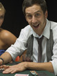 Happy man at poker game