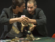 Men fighting at poker game