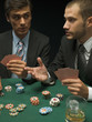 Men arguing at poker