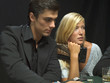 Couple playing poker game