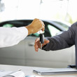 A young man buying a new car