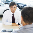 A salesman talking to a customer