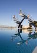 Photo : Three divers standing on diving boards