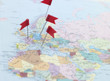 Red flag pins on Europe map
