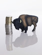 Euro coins next to bison