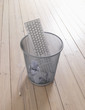 Computer keyboard in trash bin