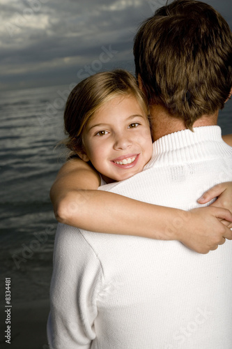 Photo: A father and daughter on a beach A father and daughter on a beach
