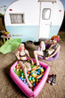 Photo : Women in front of a trailer Women in front of a trailer
