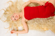 Blonde lying on the fur