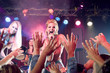 A girl pop group performing