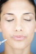 A young woman having a collagen injection