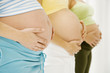 Three pregnant women
