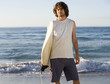 A man holding a surfboard