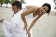A groom carrying his bride