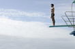 A diver standing on a diving board
