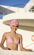 A woman in a bikini and swimming hat