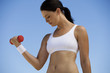A young woman exercising