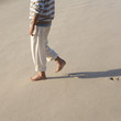 A man walking on a beach