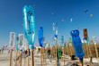 Painted bottles with smiling faces