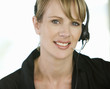 A young woman wearing an audio headset