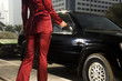 A businesswoman parking her car