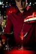 A barman mixing cocktails