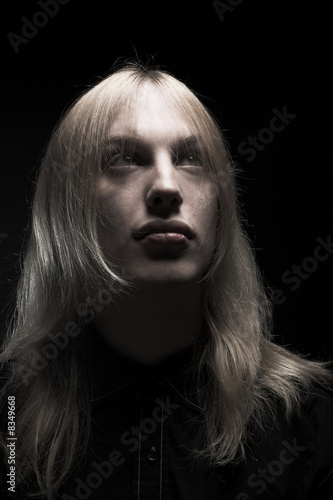 Photo: Young man with long blond hair Young man with long blond hair