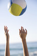 A woman catching a ball