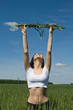 The girl in field with ears in hands The girl in field with ears in hands